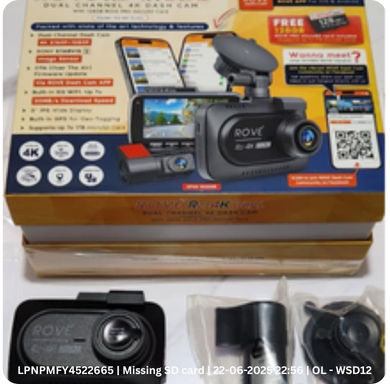Returned dash cam box photographed at intake with the SD card missing, stamped with its LPN, time and warehouse